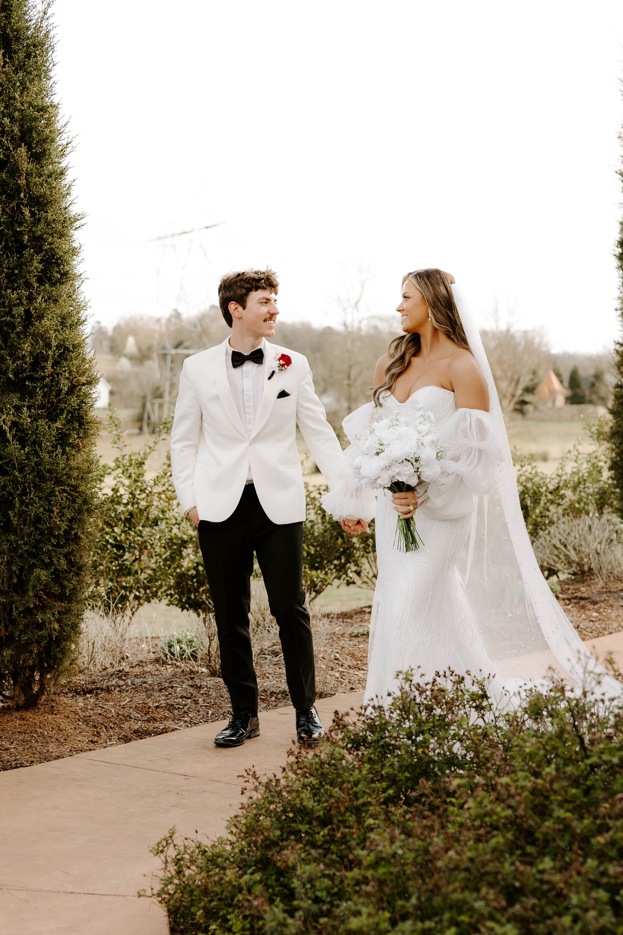 Bride and groom in a garden