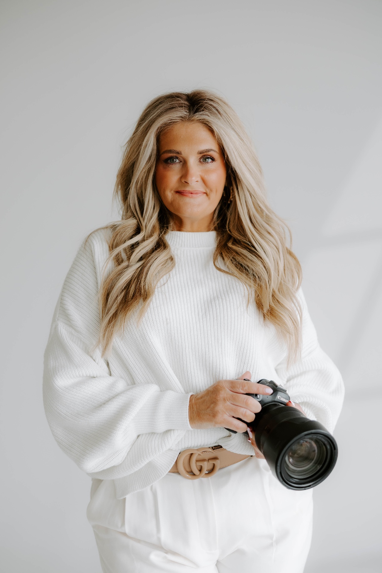 Jennifer Clark holding her camera